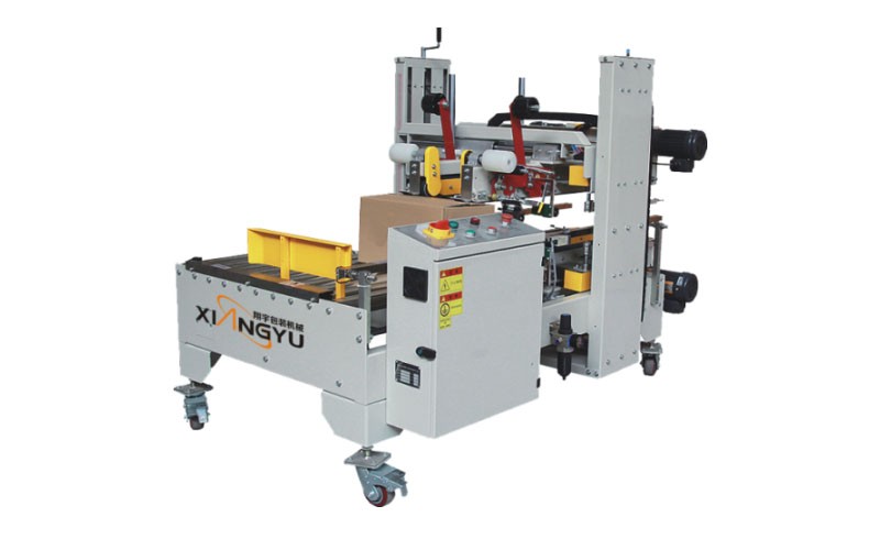 Máy dán thùng carton dẫn động bằng dây đai bốn hướng